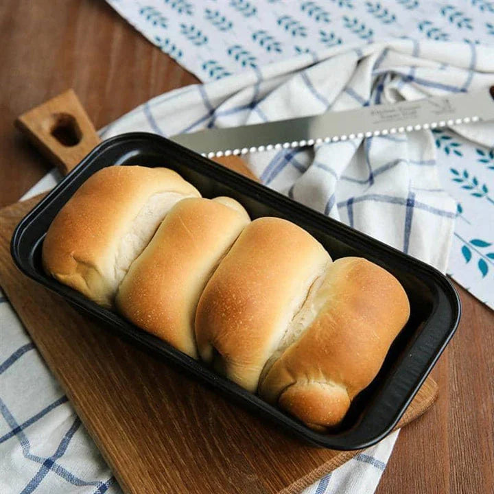 Trendha Rectangular Loaf Pan in black color, featuring a non-stick surface and durable tinplate construction for reliable baking in Kiwi kitchens.