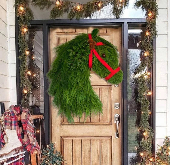 Rustic double horse head Christmas wreath with lifelike pine branches, a unique and charming Kiwi-inspired holiday decoration