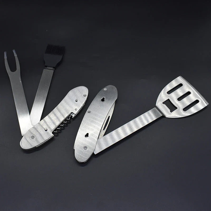 A versatile 5-in-1 stainless steel BBQ grilling tool with various attachments for flipping burgers, searing steaks, and skewering veggies.