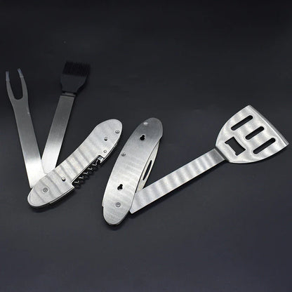 A versatile 5-in-1 stainless steel BBQ grilling tool with various attachments for flipping burgers, searing steaks, and skewering veggies.