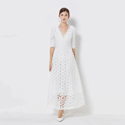A white lace maxi dress with a stylish V-neck design, perfect for special occasions.
