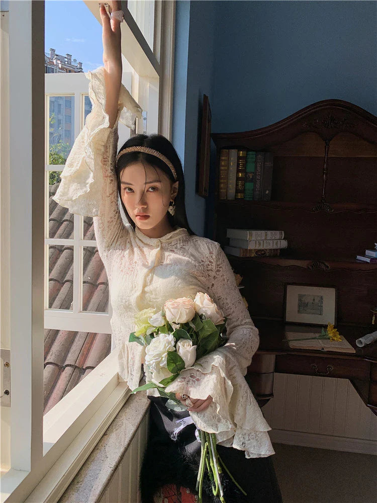 Lace patchwork shirt with ruffled sleeves in a beige color, perfect for casual and formal occasions