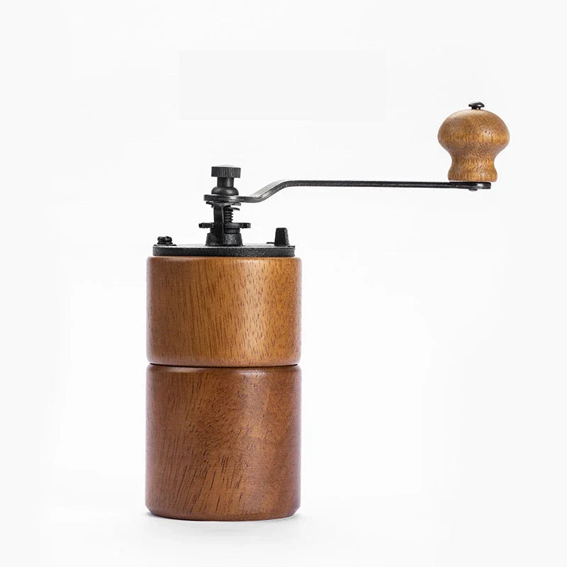 Elegant wooden manual coffee grinder with premium steel conical burr for consistent grinding and optimal coffee flavour.