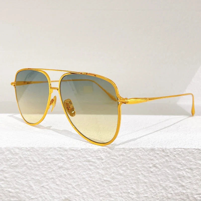 Premium pure titanium pilot sunglasses with a luxurious gold finish, offering superior UV protection and timeless vintage-inspired design.