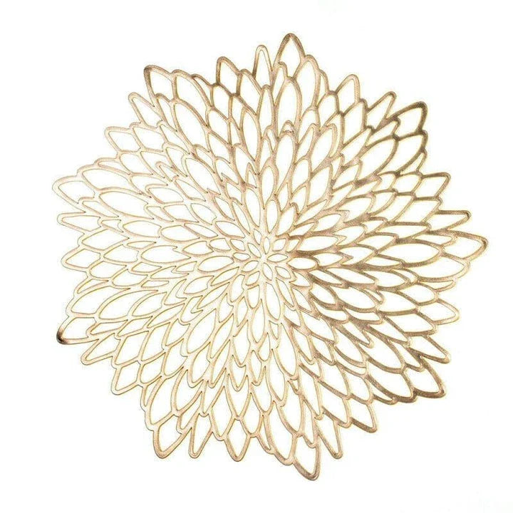 Flower-shaped PVC placemat in gold color, adding natural beauty and elegance to a dining table setting.