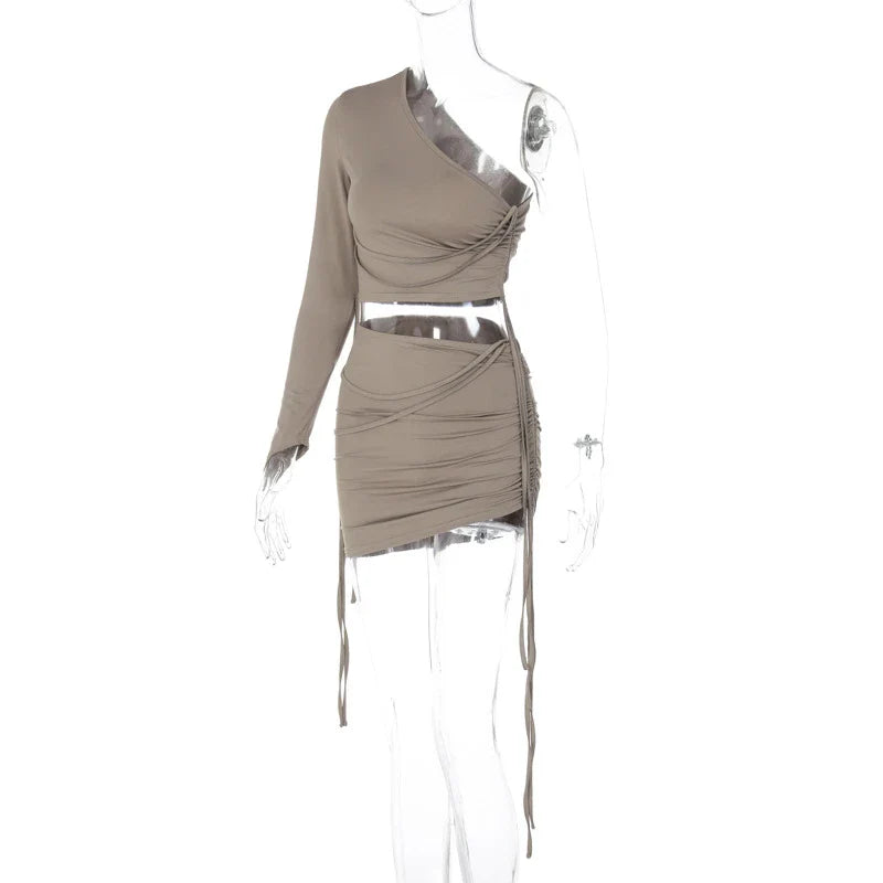 A stylish one-shoulder top and drawstring skirt set made from premium milk silk fabric, perfect for elevating your casual wardrobe.