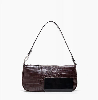 Stylish French-inspired shoulder bag with unique animal print patterns, made of premium PU leather for the modern Kiwi lifestyle