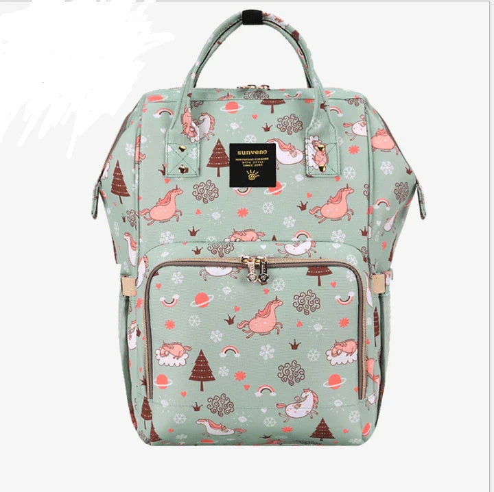 Stylish and practical mummy bag with reinforced handles, durable buckles, and separate bottling area for Kiwi mums