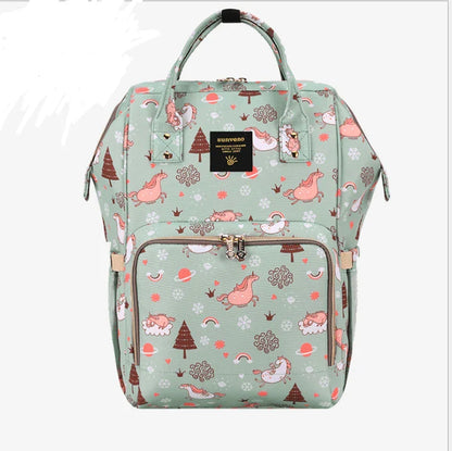 Stylish and practical mummy bag with reinforced handles, durable buckles, and separate bottling area for Kiwi mums