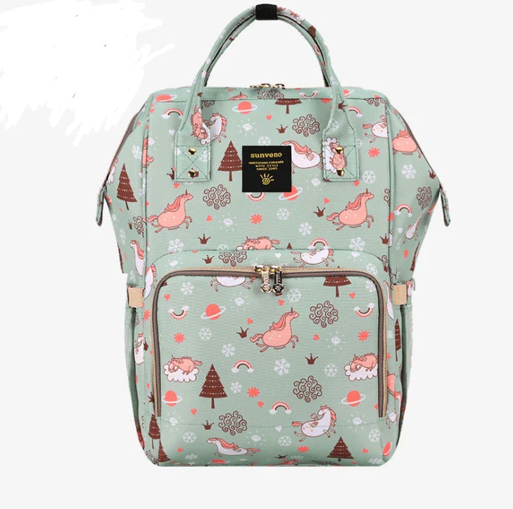 Stylish and practical mummy bag with reinforced handles, durable buckles, and separate bottling area for Kiwi mums