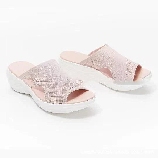 Plus-size women's sandals in various colors with a breathable weave upper and supportive polyurethane sole