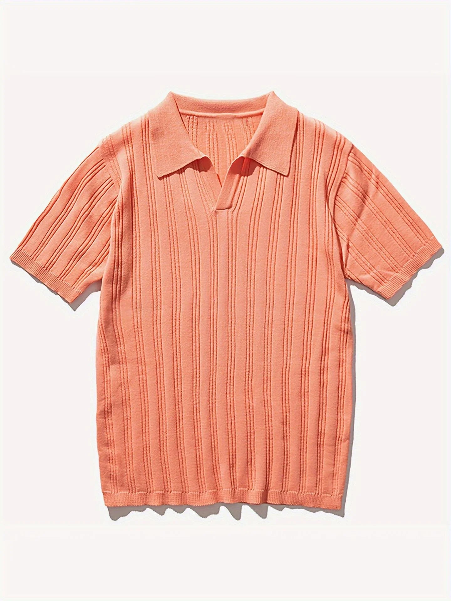 Premium Kiwi-made acrylic knitted tee in a vibrant orange-red hue, featuring a slim-fit design and classic short sleeves