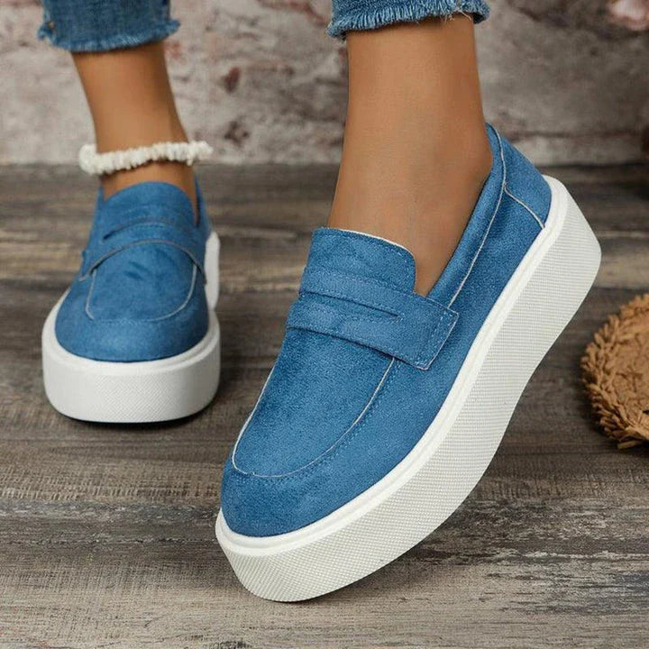 Women's casual platform loafers with a round toe design, slip-on construction, and a durable rubber sole for everyday comfort and style.