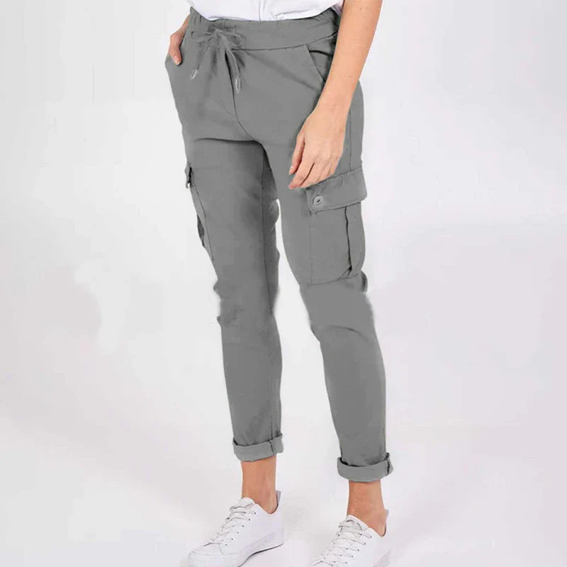 Stylish women's cargo pants with drawstring waist, pockets, and solid colour design