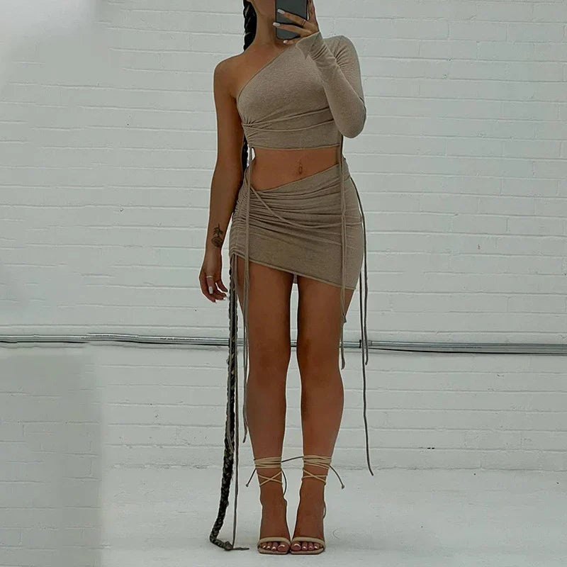 A stylish one-shoulder top and drawstring skirt set made from premium milk silk fabric, perfect for elevating your casual wardrobe.