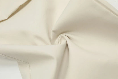 Stylish black overalls with pleated pockets, designed for the active Kiwi lifestyle