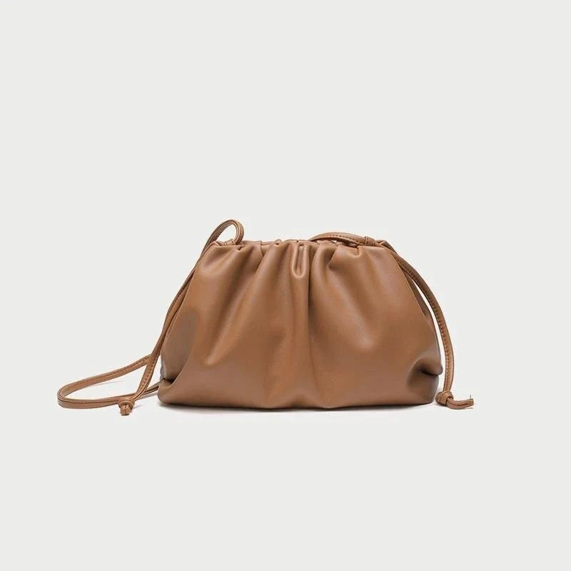 Elegant soft PU leather crossbody bag in a timeless brown colour, featuring a versatile design and premium quality construction.