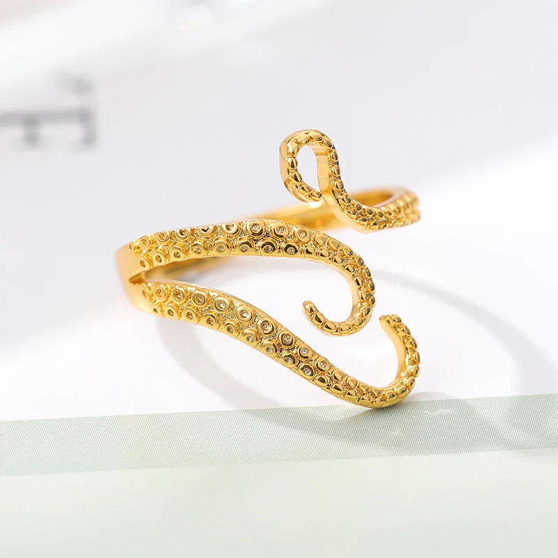 Adjustable octopus tentacle wrap ring in gold, a unique and versatile accessory for Kiwis