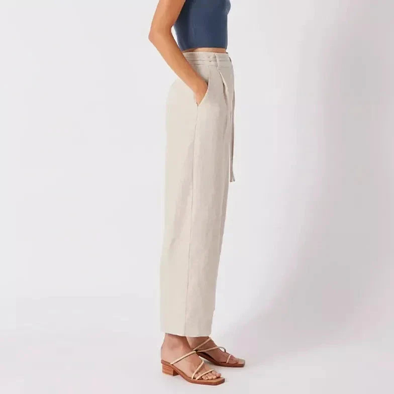 Elegant high-waist linen trousers with Korean-inspired design, featuring lace-up detail and button decorations for a sophisticated and comfortable look.