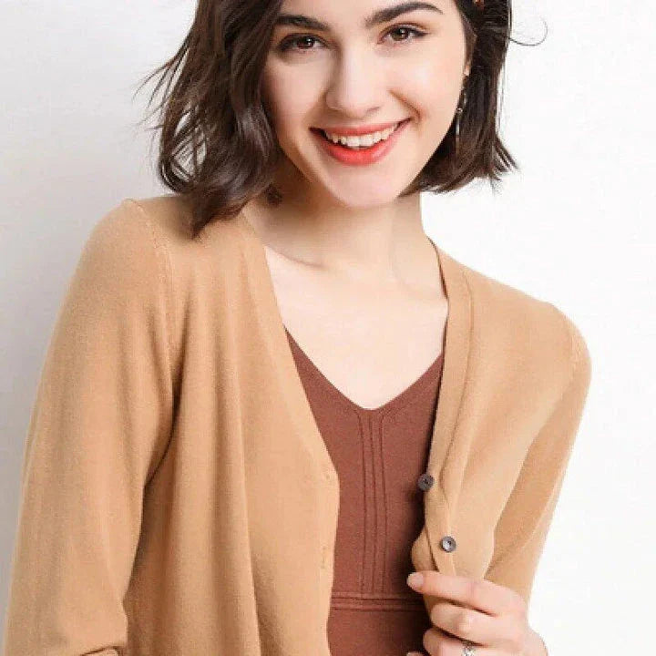 Stylish v-neck cardigan in various colors, featuring a flattering design and luxurious cashmere-rich composition for the modern Kiwi woman