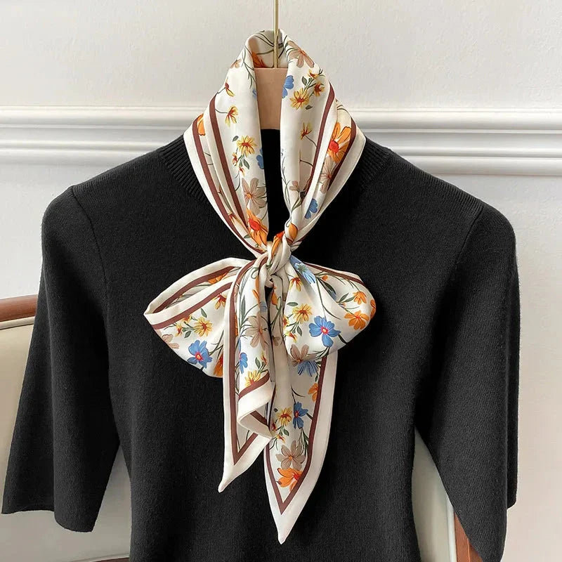 Elegant floral print scarf in soft, cotton-like polyester fabric - a versatile Kiwi accessory for year-round style