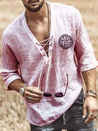 A men's t-shirt with a distinctive chest tie detail, offering a stylish and unique Kiwi-inspired look.