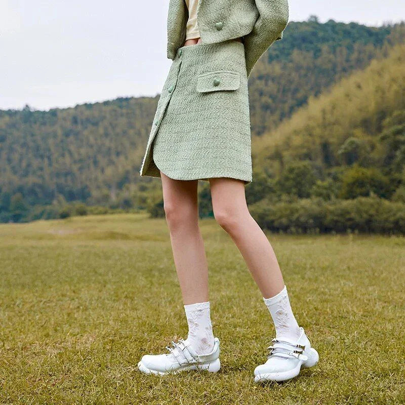 Timeless Plaid A-Line Skirt with Asymmetric Design and Button Details