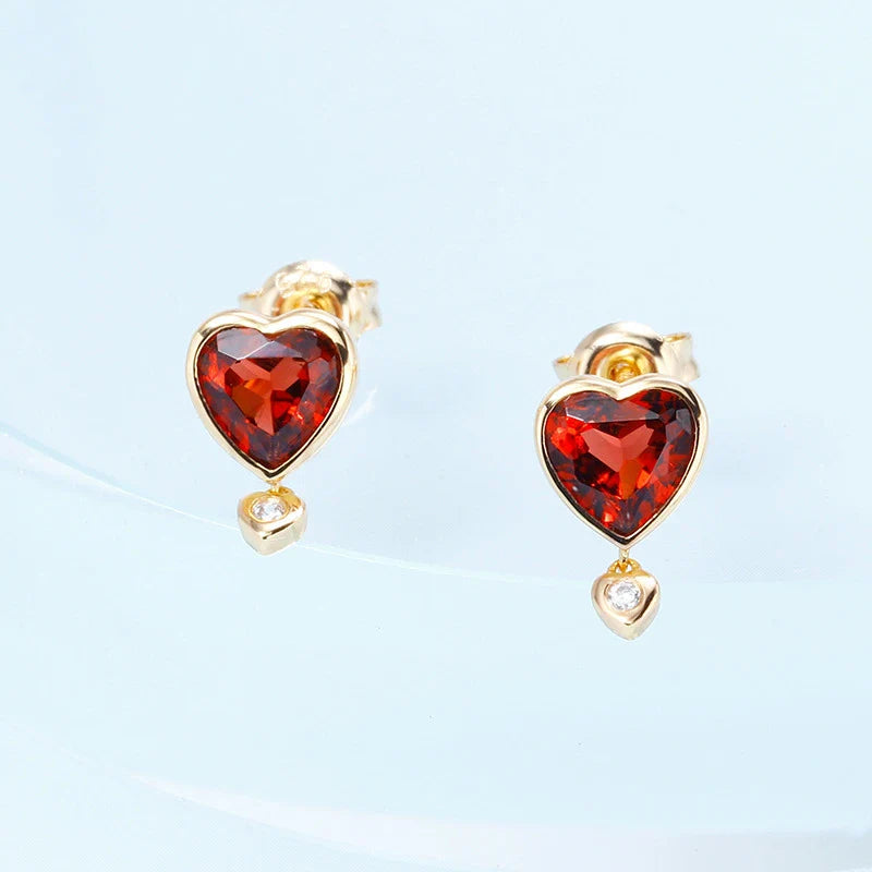 Stylish pomegranate garnet and zircon earrings in silver setting, with retro-inspired silhouette and vibrant gemstone accents