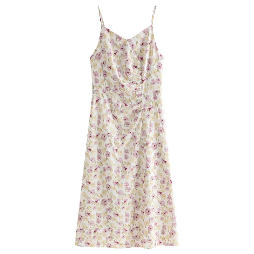 Summery floral suspender dress with spaghetti straps, V-neckline, and pencil silhouette, perfect for romantic summer occasions.