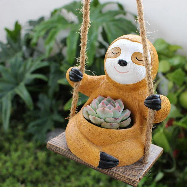 Charming Hanging Sloth Planter in resin material with a vibrant, glossy finish for home and garden decor