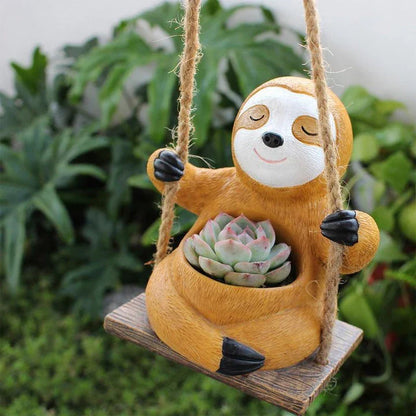 Charming Hanging Sloth Planter in resin material with a vibrant, glossy finish for home and garden decor