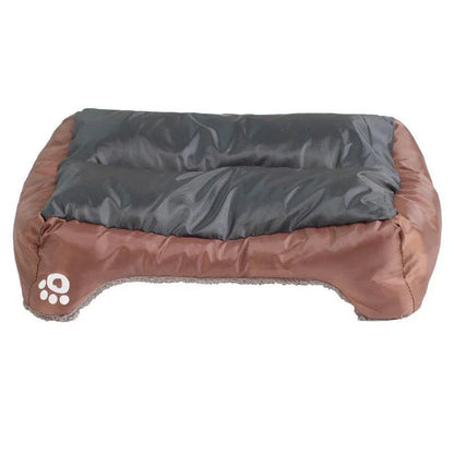 A cozy, waterproof pet bed featuring a soft fleece lining and paw print design, perfect for providing comfort and support for your beloved companion.