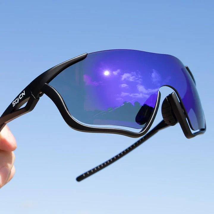 Rugged multi-sport sunglasses with UV400 polycarbonate lenses, perfect for outdoor activities like cycling, hiking, and driving in New Zealand