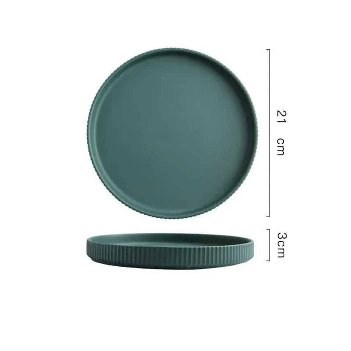 Stylish assorted candy-colored ribbed ceramic tableware set including plates and bowls, made in New Zealand with eco-friendly materials