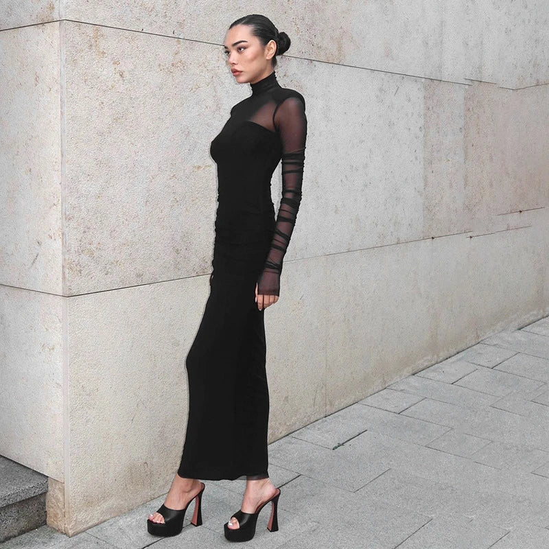 Elegant turtleneck dress with mesh stitching details, slim-fit silhouette, and long sleeves