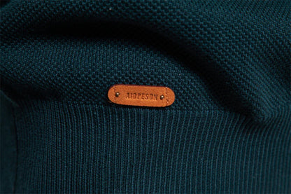 A stylish, slim-fit sweater in a modern colour-blocking design of Lake Green, White, and Grey, made with premium cotton for exceptional comfort and New Zealand casual style.