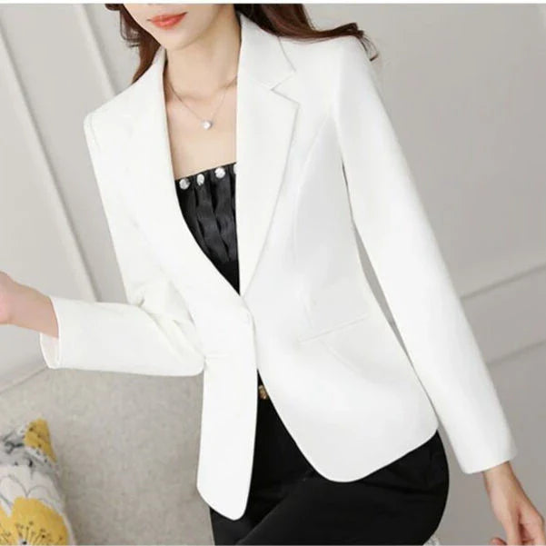 Stylish and breezy short suit jacket in a minimalist Korean-inspired design, made from high-quality polyester for lasting comfort and fashion-forward appeal.