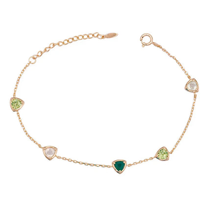 A beautiful, eco-friendly bracelet featuring natural green gems in a modern geometric design
