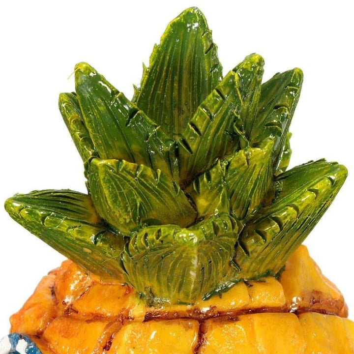 Wooden pineapple aquarium decorations adding tropical flair to an underwater display