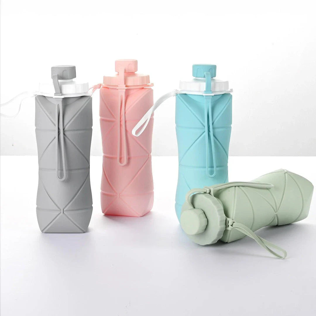 600ml folding silicone water bottle in green, pink, blue, and gray colors for outdoor sports and travel use