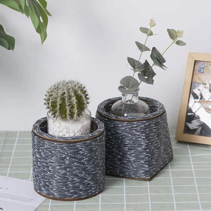 Hand-woven rattan planter with lush greenery, perfect for indoor and outdoor display