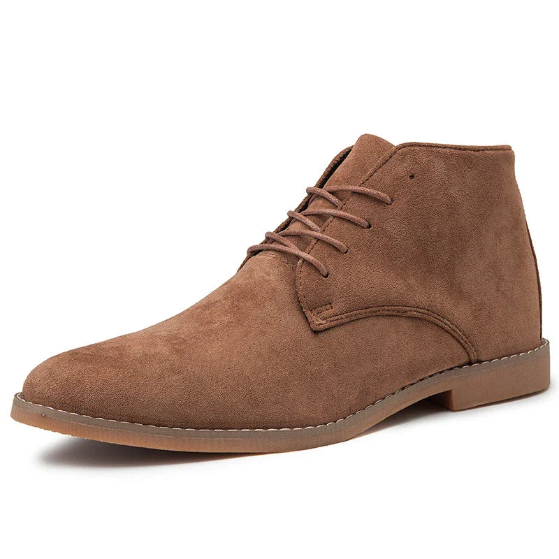 Trendy men's leather boots with a pointed toe and British-inspired design, featuring a front tie closure and a rubber sole for comfort and stability.