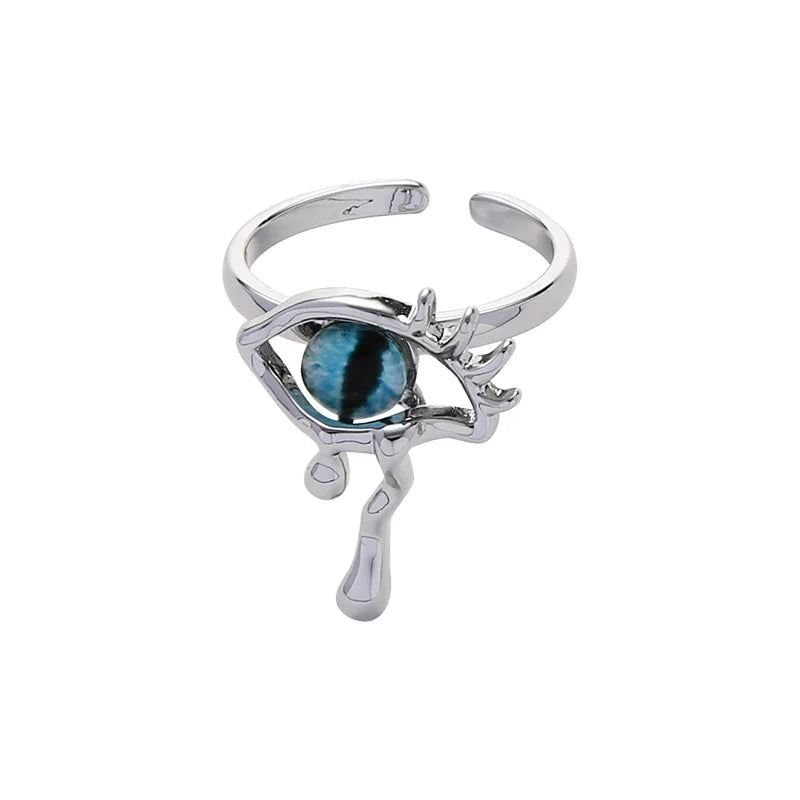 A stylish silver ring featuring a cat-eye design with a devilish twist, perfect for adding a touch of playful elegance to any Kiwi girl's look.