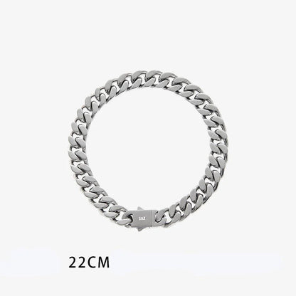 Stylish titanium steel bracelet with Cuban-inspired design, adjustable length, and polished finish.