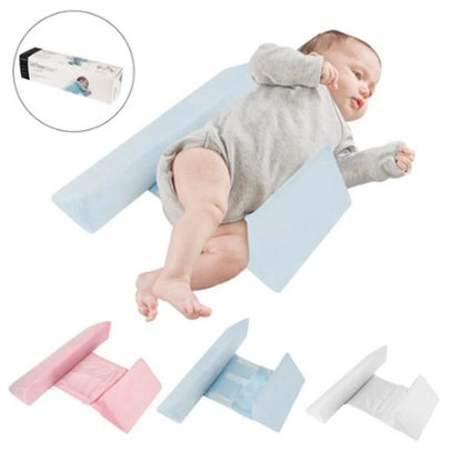 Ergonomic newborn baby sleep pillow with triangular design and removable pillowcase for comfortable, supported side sleeping