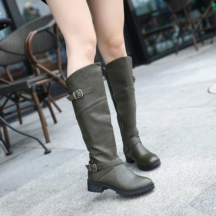 Women's boots with low heels and round toes, available in multiple colors and sizes for a comfortable and stylish look.