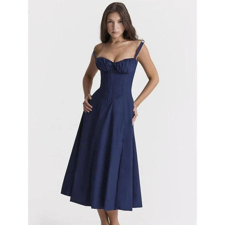 Elegant backless midi sundress in blue, featuring a high split and A-line silhouette for a flattering fit