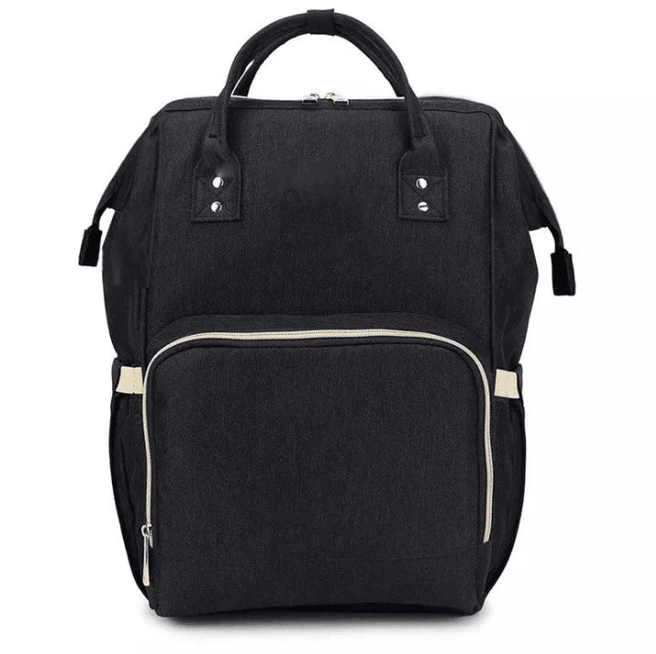 Stylish and practical mummy bag with reinforced handles, durable buckles, and separate bottling area for Kiwi mums