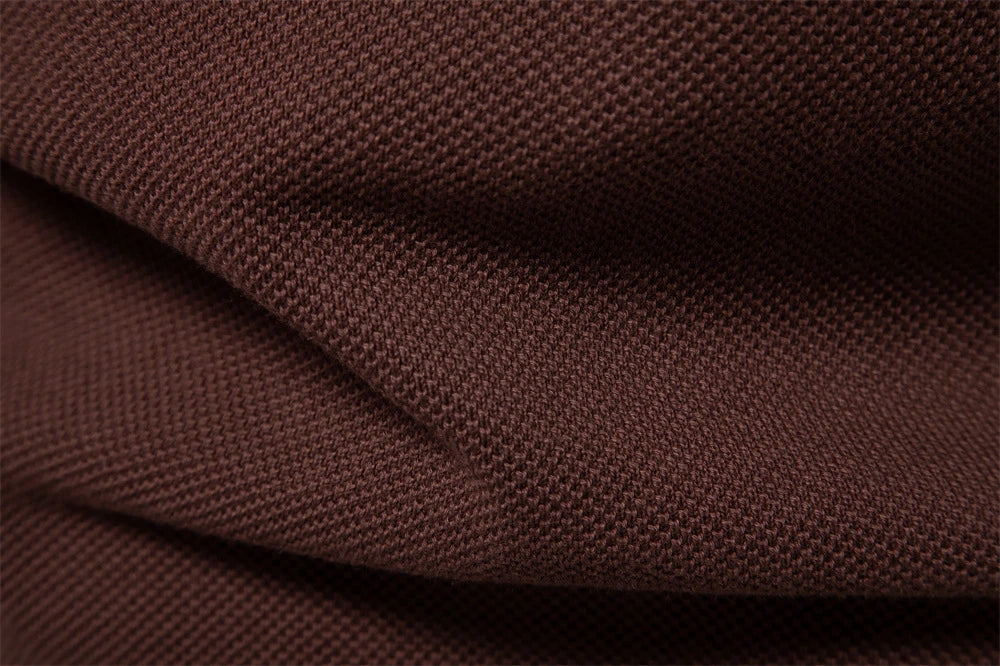 A stylish, slim-fit sweater in a modern colour-blocking design of Lake Green, White, and Grey, made with premium cotton for exceptional comfort and New Zealand casual style.