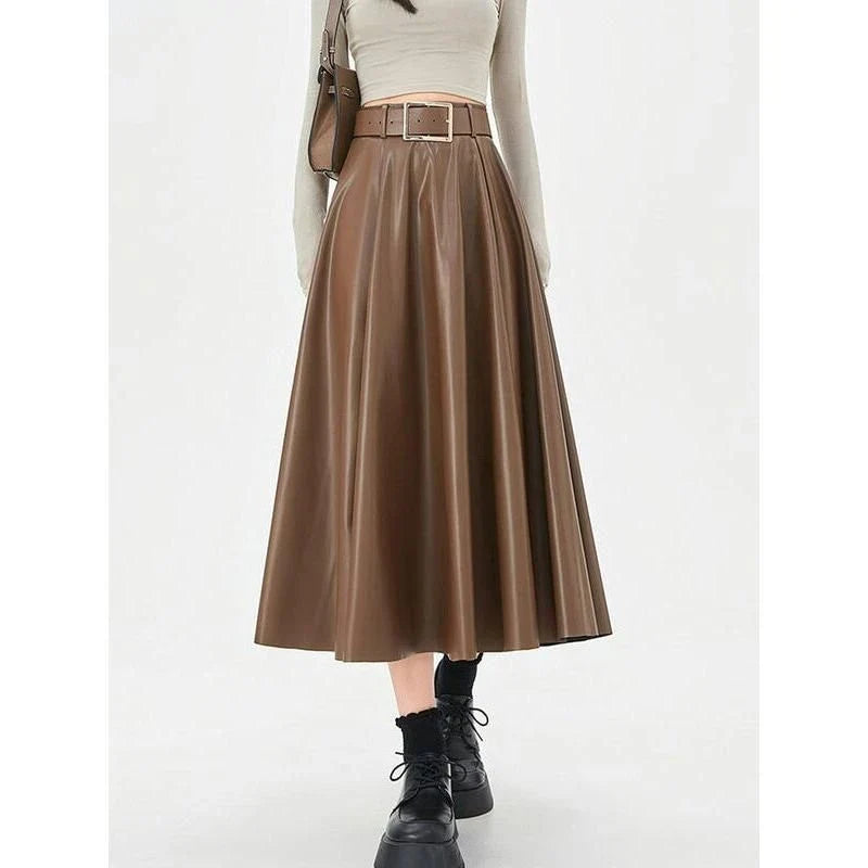 Elegant high-waist faux leather skirt with stylish belt, perfect for office or casual wear